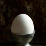 White Egg in cup and some sea salt | fine art photography by Judith den Hollander | Food photography